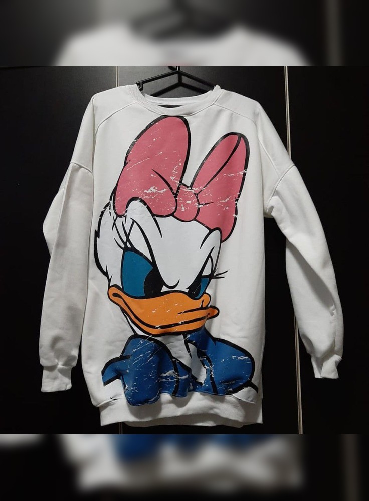 Poleras oversize online disney